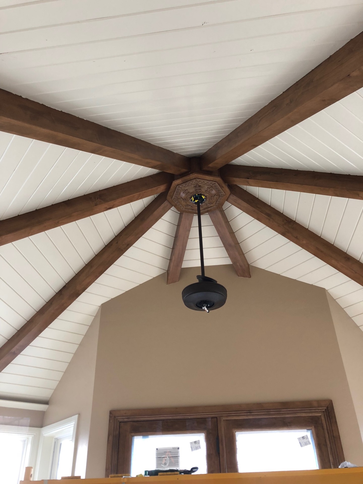 Vaulted ceiling with custom wood beams
