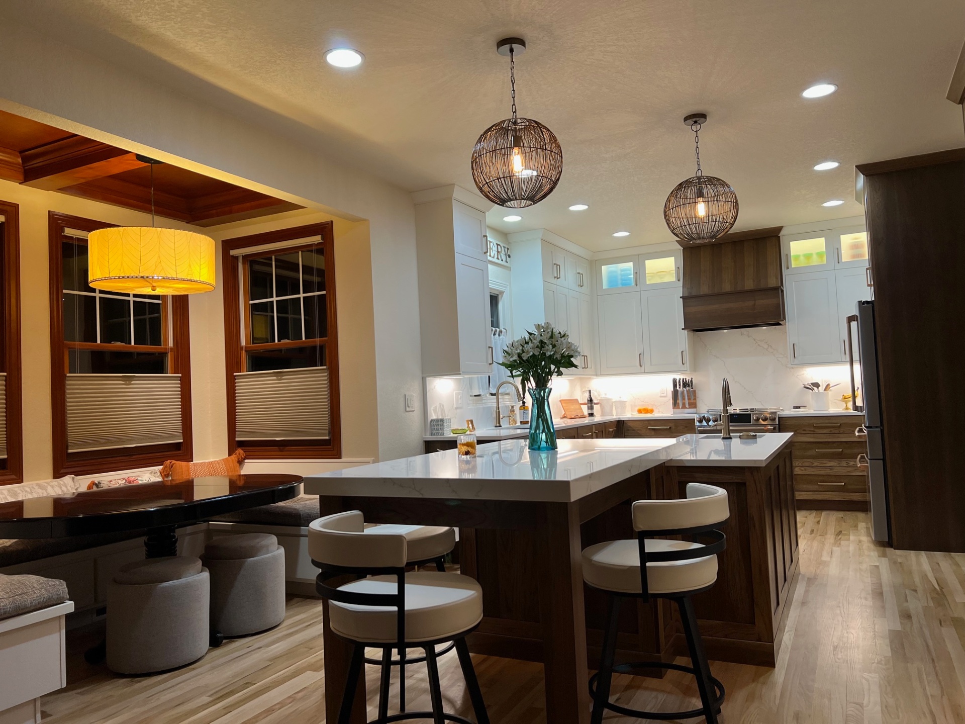 Open-concept kitchen with custom island and pendant lighting